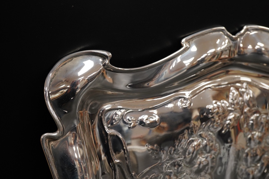 An Edwardian repousse silver dressing table tray, William Neale & Son, Chester, 1903, 30cm, 9.2oz.